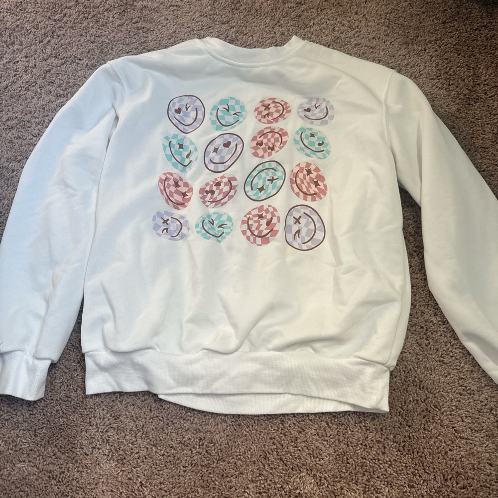 Cute white SHEIN crewneck with 🥰 on there never won’t